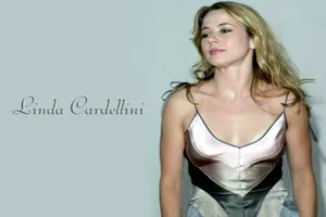 Elegant Linda Cardellini Posing At A Photoshoot Wallpaper