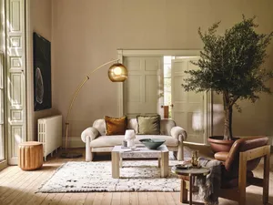 Elegant Living Room Interiorwith Natural Elements Wallpaper