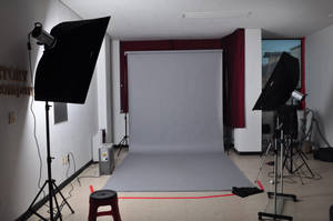 Elegant Photography Studio With Professional Equipment Wallpaper