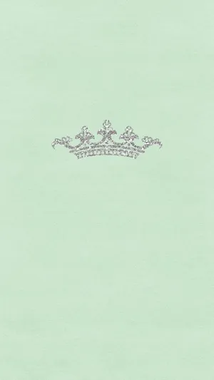 Elegant Royal Crown On Mint Green Backdrop Wallpaper