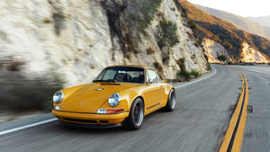 Elegant Singer Porsche In Motion Wallpaper