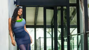 Elegant Womanin Blue Dress Outdoors Wallpaper