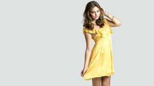 Elegant Yellow Dress Photoshoot Wallpaper