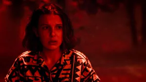 Eleven From Stranger Things In Red Filter Wallpaper