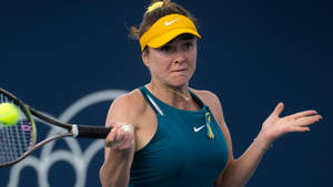 Elina Svitolina Hitting The Tennis Ball Wallpaper