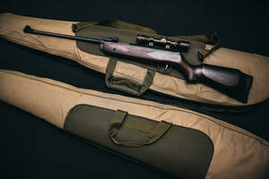 Elite Sniper Gun In Drag Bag Wallpaper