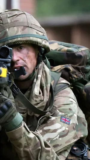 Elite Sniper On Duty: Precision, Patience, And Skill In Action Wallpaper