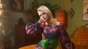 Elle Fanning In Floral Dress Wallpaper