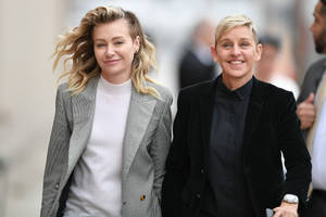 Ellen Degeneres Walking Beside Portia Wallpaper