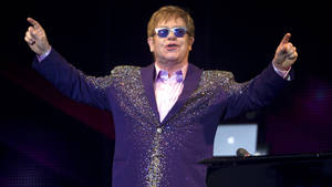Elton John Glam Rock Singer Wallpaper