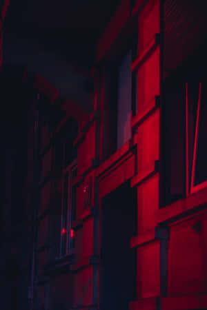 Embrace The Bold And Mysterious Dark Red Aesthetic Wallpaper