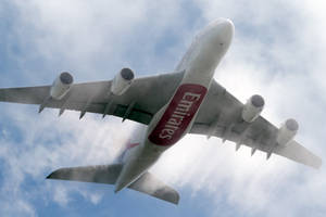 Emirates A380 Soaring In The Sky Wallpaper