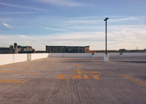 Empty Building Rooftop Parking Lot Wallpaper