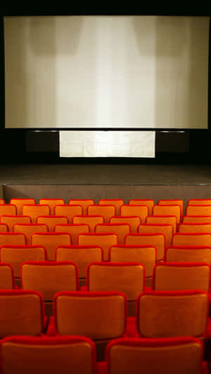 Empty Cinema Hall Red Seats Wallpaper