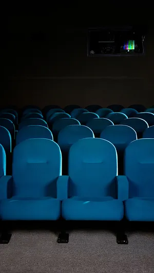 Empty Cinema Seatswith Projection Window Wallpaper