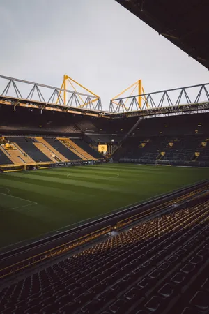 Empty Football Stadium Sunlight Wallpaper