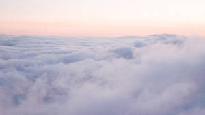 Enchanting Beauty Of Pale Purple Aesthetic Clouds Wallpaper