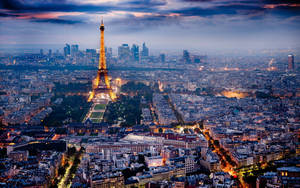 Enchanting Night View Of Paris Wallpaper