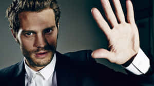 Engaging Portrait Of Jamie Dornan Wallpaper