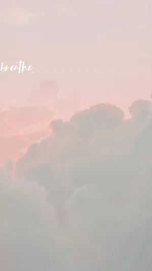 Enjoy A Peaceful And Dreamy Sky Moment With Angel Aesthetic Clouds Wallpaper
