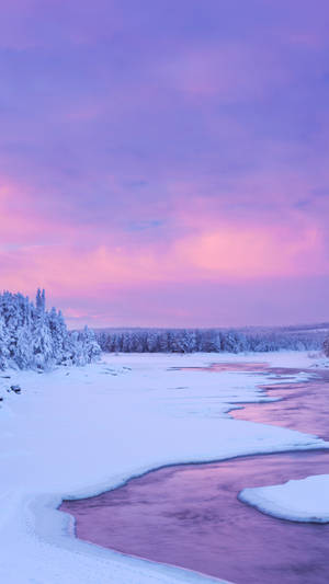 Enjoy The Beauty Of A Pink Sunset From The Comfort Of Your Iphone Wallpaper