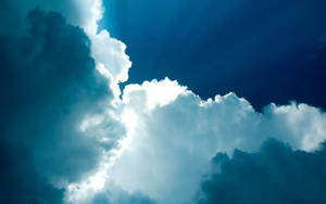 Enjoy The Beauty Of The Light Blue Skies Wallpaper