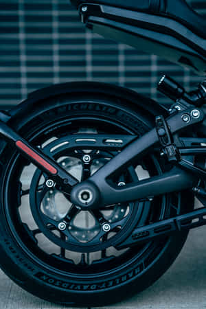 Enjoy The Freedom Of Riding On A Motorcycle With Your Iphone Wallpaper