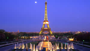 Enjoy The Iconic City Of Lights Right On Your Desktop. Wallpaper
