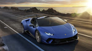 Enjoy The Ride In This Blue Car Wallpaper