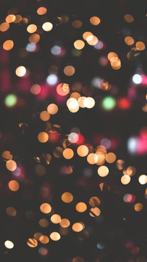 Enjoy The Shining Splendour Of This Christmas Lights Aesthetic Wallpaper