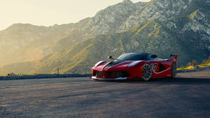 Enjoy The Speed Behind The Wheel Of A Ferrari Wallpaper