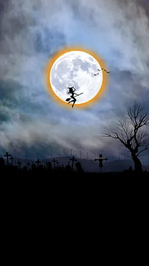 Enjoy Your Halloween Festivities With A Mischievous Witch Wallpaper