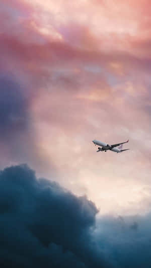 Enjoy Your Travels With An Iphone In Hand Wallpaper