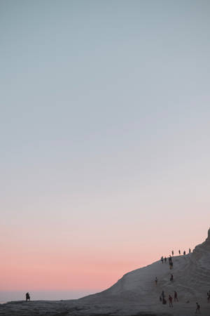Enjoying A Beautiful Ombre Sunset Wallpaper