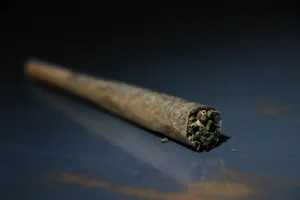 Enjoying A Tasty Weed Blunt Wallpaper