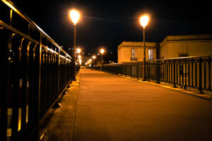 Enthralling Orange City Street View At Twilight Wallpaper