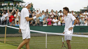 Epic Encounter: Nicolas Mahut Vs. John Isner At Wimbledon Wallpaper