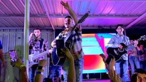 Eslabon Armado Performing On Stage Wallpaper