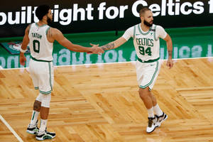 Evan Fournier And Jayson Tatum High Five Wallpaper