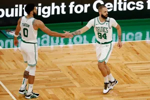 Evan Fournier And Jayson Tatum High Five Wallpaper