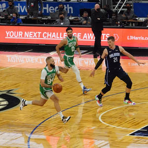 Evan Fournier Running Boston Celtics Vs. Orlando Magic Wallpaper