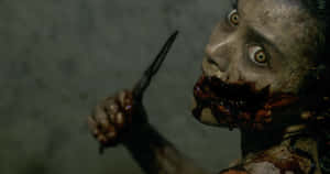 Evil Dead Mouth Mutilation Wallpaper