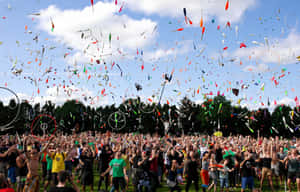 Excitement In The Air At A Vibrant Music Festival Wallpaper