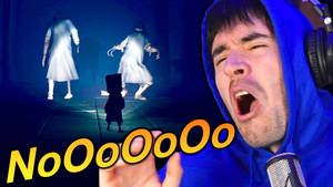 Exciting Picture Of Juegerman Engrossed In Gameplay With Obscure Figures. Wallpaper