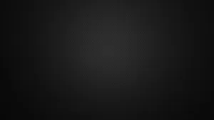 Experience A Modernized Yet Simplistic Look With This Sleek Plain Black Desktop Wallpaper Wallpaper