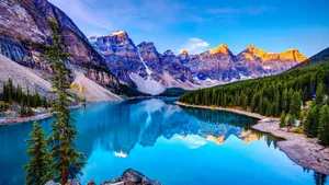 Experience An Ethereal Sunrise With Nature Ipad Wallpaper