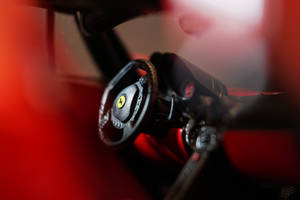 Experience The Luxury Of The Ferrari Automobile Wallpaper