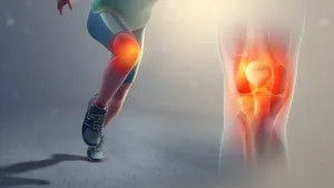 Experienced Therapist Guiding A Patient Through Joint Mobility Improvement Exercises Wallpaper