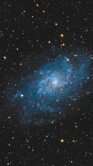 Explore The Beauty Of The Green And Blue Galaxy! Wallpaper
