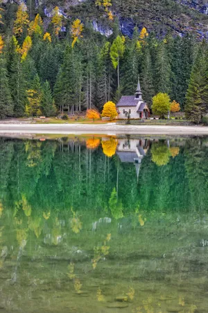 Explore The Castle And Its Autumn Reflection Wallpaper
